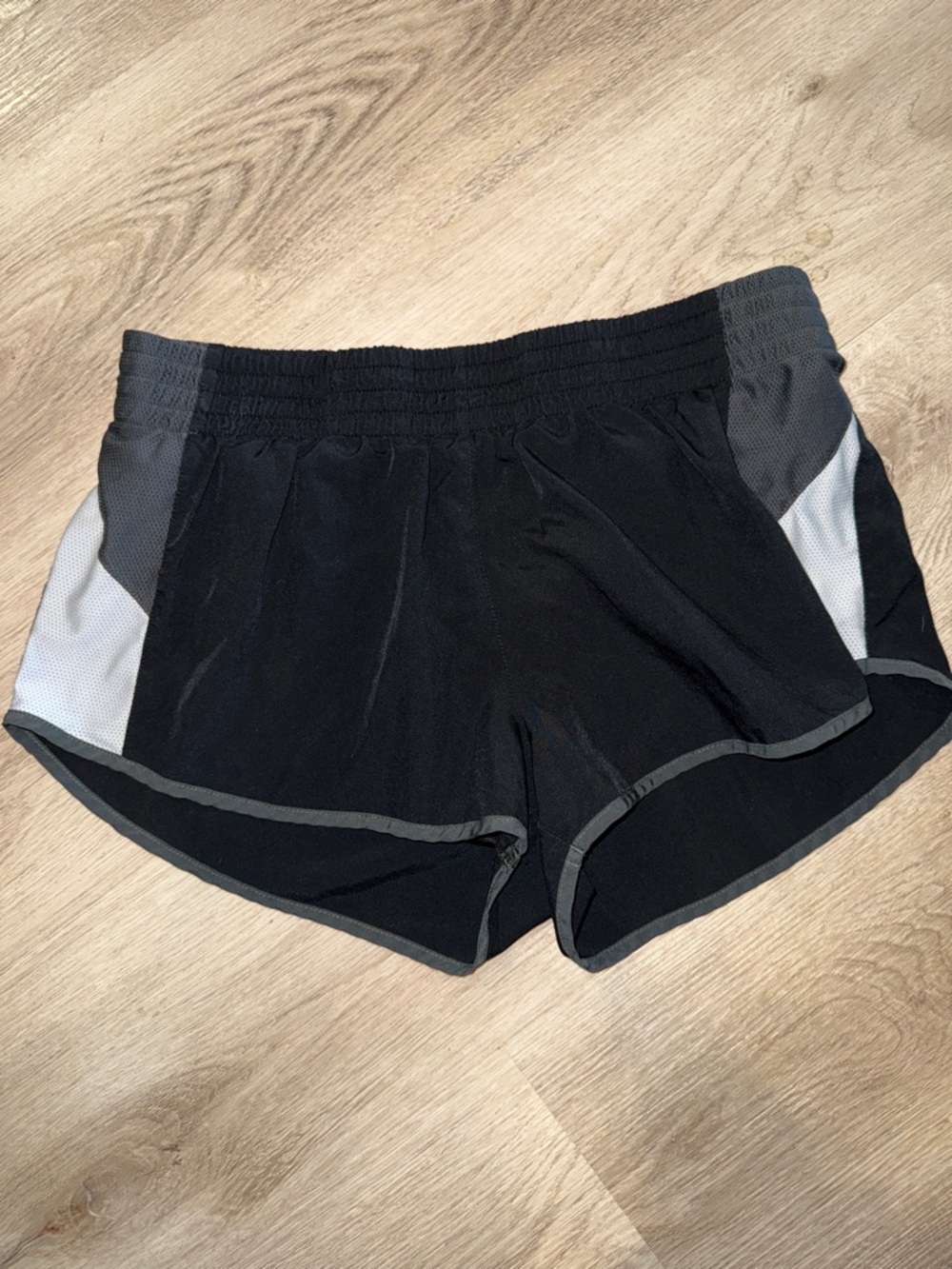 Nike Black Athletic Shorts with Gray Trim and White Side Panels
